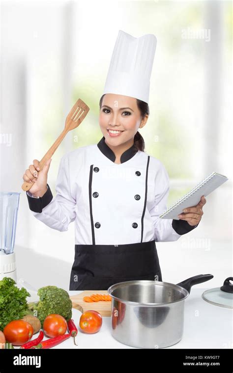 Portrait Of Pretty Chef Woman Preparing Cooking Stock Photo Alamy