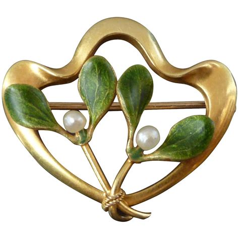Maybe you would like to learn more about one of these? Festive art nouveau mistletoe brooch by Krementz Co of ...