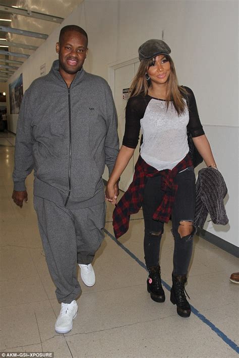 Tamar Braxton And Husband Vincent Herbert Hold Hands At Lax Daily