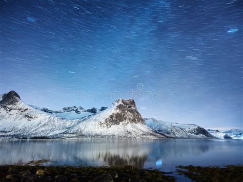 Mountains And Starry Night Sky Senja Islands Norway Reflection On