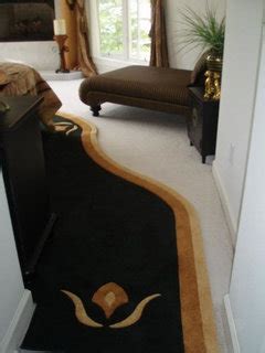 Trim the rug pad with scissors or a utility knife to fit your rug size, if necessary. Do you put Area Rugs over carpet?