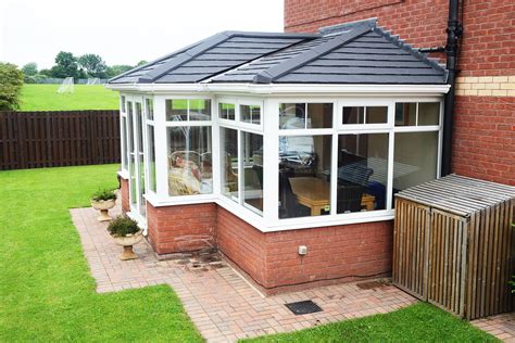 Stunning Tiled Conservatory roof; Supalite by Solarframe, with stunning Charcoal Metrolite Tiles ...