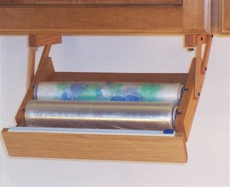 Deep tiers and can be installed to cabinet doors or walls for extra storage of cleaning supplies or small items. INTRODUCING OUR NEW.... 'Ultimate Plastic Wrap Dispenser'....A bright idea in … | Plastic wrap ...