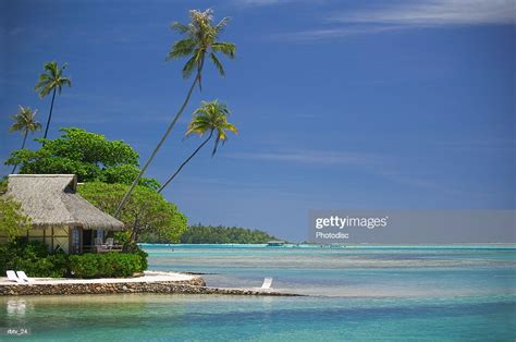 Landscape Photograph Of A Beautiful Beach And Hut In A Tropical Locale