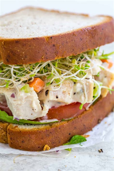 The chicken is tossed with avocado oil mayonnaise, capers and dill relish, then layered on crusty bread with sliced radishes and butter lettuce. Chicken Salad Sandwich Recipe - Jessica Gavin