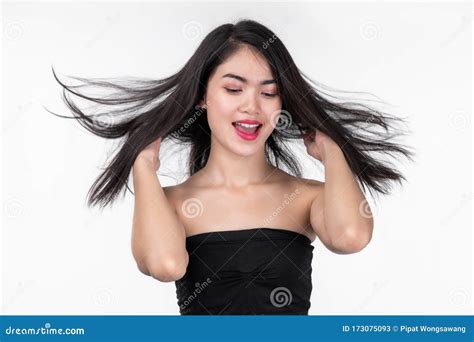 Asian Beautiful Woman To Spread The Hair On White Background Beauty