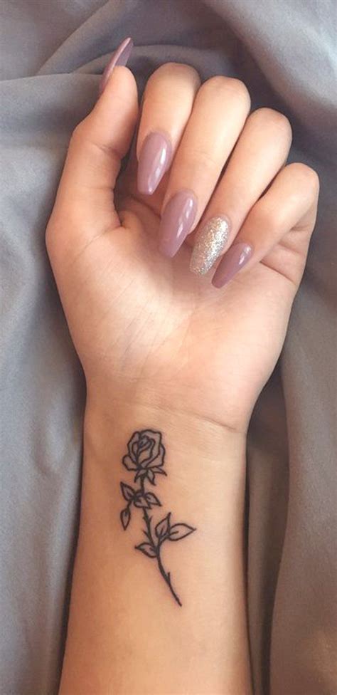 Loads of the coolest inner arm tattoos you must see. Small Rose Wrist Tattoo Ideas for Women - Minimal Flower ...