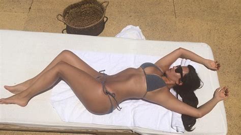 kim kardashian shows off tan bod shares bikini picture us weekly