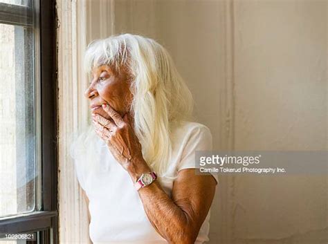 Lonely Old Woman Window Photos And Premium High Res Pictures Getty Images