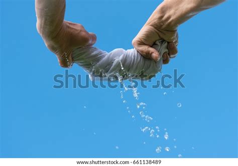 Hands Squeeze Wet Cloth Stock Photo 661138489 Shutterstock