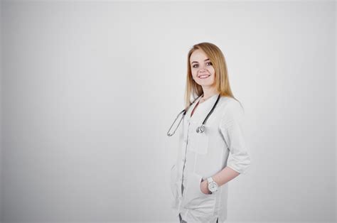 premium photo blonde doctor nurse with stethoscope isolated on white background