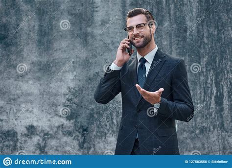Business Talk Handsome Young Man In Full Suit Talking On The Phone