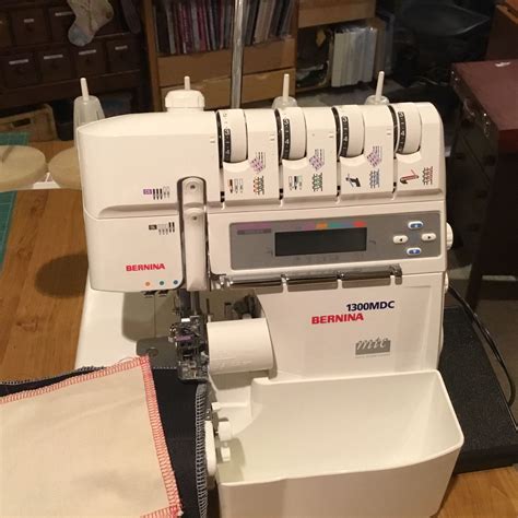 bernina serger overlock 1300mdc with all accessories four years old has the cover stitch it