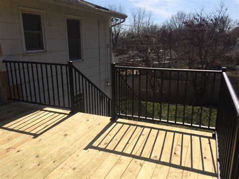 Westbury Aluminum Railing Black With Metal Posts Attached To Deck