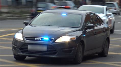 Unmarked Ford Mondeo Q Car Responding Using Sirens And Lights