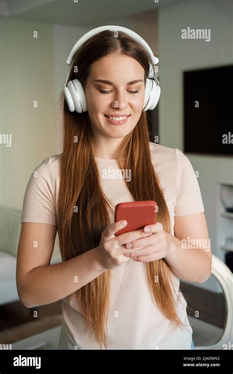 Smiling Young Woman Teenager N Headphone Holding Smartphone Portrait