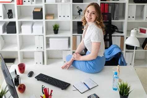Beautiful Young Girl Sitting At Desk In Office Stock Image Image Of