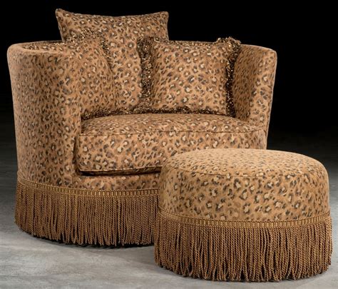 The chair looks like gray in the picture but it's not really the gray color. Leopard Print Swivel Barrel Chair With Ottoman.