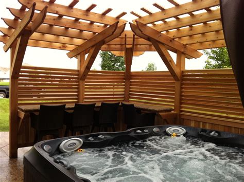 Stamped Concrete Hot Tub Patio With Custom Pergola For Privacy And