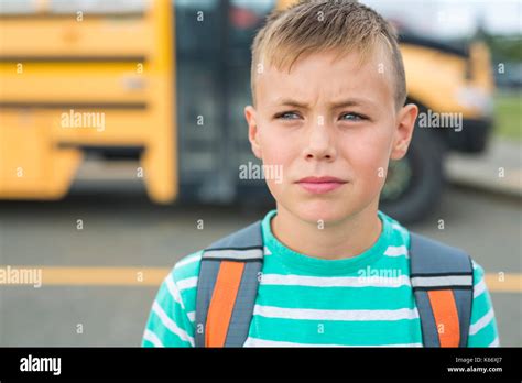 Pre Teen Boy Outside At School Stock Photo Alamy