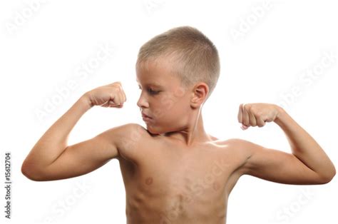 Young Boy Flexes His Muscles Stock Photo Adobe Stock