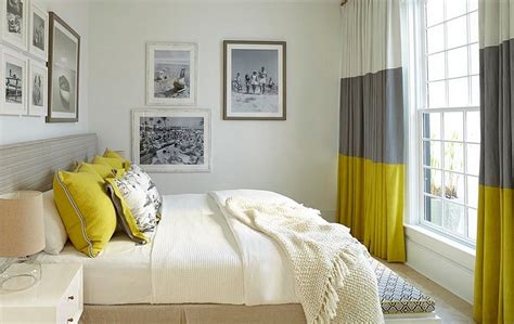 Happy mother and her children lying on a bed. Cheerful Sophistication: 25 Elegant Gray and Yellow Bedrooms