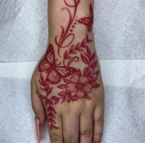 Pin By Yamz On Her Ink In 2020 Hand Tattoos Tattoos Red Ink Tattoos