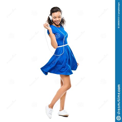 Feeling Free And Beautiful A Beautiful Woman Dancing A Blue Dress