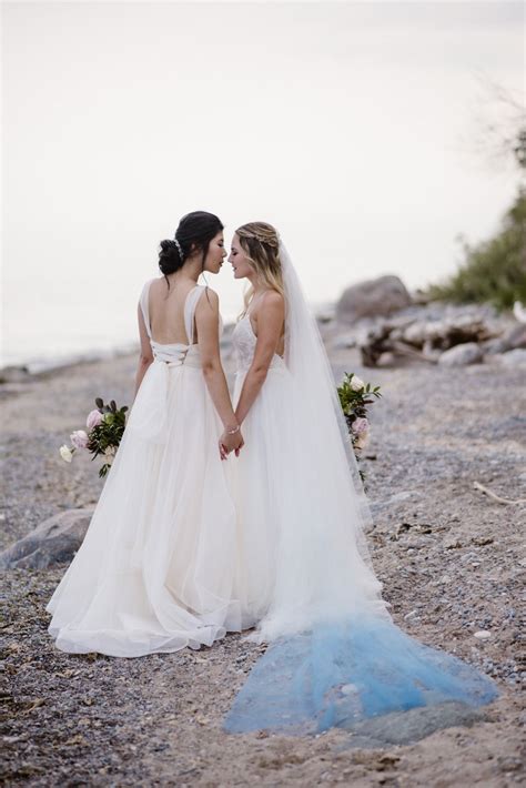 dreamy misty blue and burgundy beach wedding inspiration lesbian