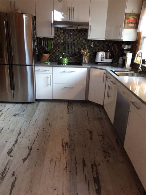 Kitchen floors need to withstand regular foot tile effect kitchen flooring ideas. A distressed vinyl perfect for a kitchen! #vinyl #flooring ...