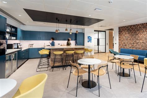 Office Cafe Featuring Blues Yellows And Natural Materials Open Office