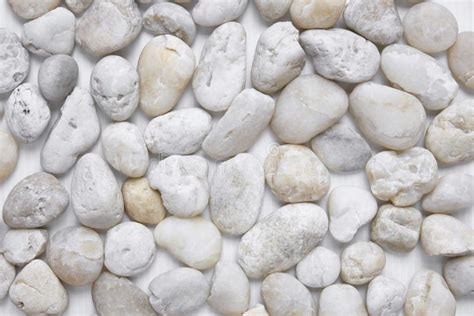 White Pebbles Stone Texture Background View From Above Closeup Stock
