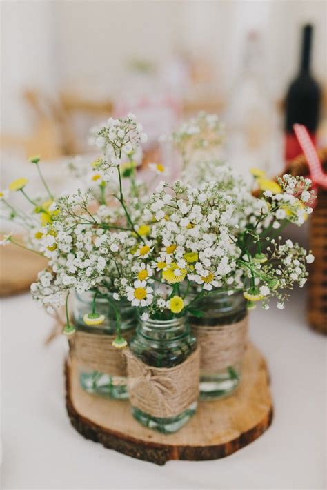 Mason Jar Wrapped With Twine Wedding Centerpiece Filled In Daisies