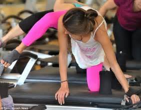 Alessandra Ambrosio Displays Her Lean Legs In Hot Pink Leggings As She Builds Muscle In A Full