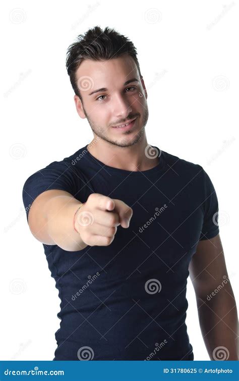 Attractive Young Man Smiling And Pointing Finger At You Stock Image