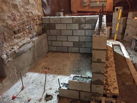 This process is slow, dirty, labor intensive work. Concrete Block Elevator Shaft - Bond Masonry Ltd.