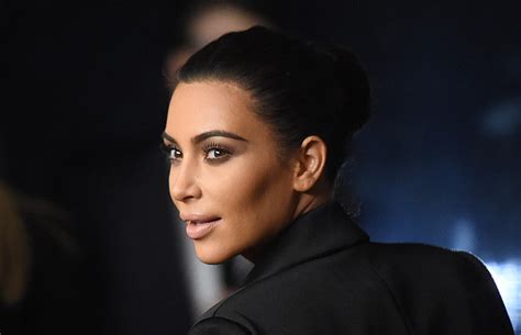 Kim Kardashian Criticized For Cropping Daughter Out Of Photo