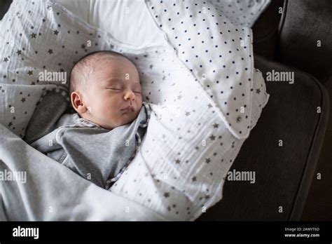 Tired Newborn Baby Boy Sleeping In Bassinet Stock Photo Alamy