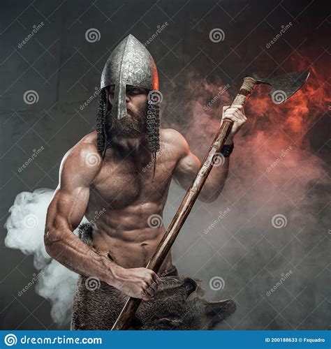 Warlike Male Viking With Naked Torso In Smoky Background Stock Image