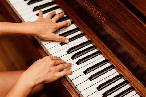 Close Up Photo Of Person Playing Piano · Free Stock Photo