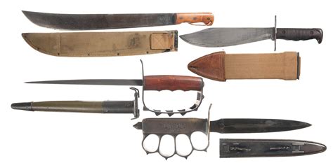 Four Us Edged Weapons With Scabbards Including Two Trench Kni Rock