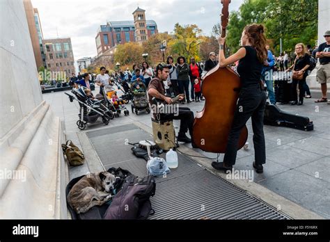 new york ny 6 november 2015 outlaw ritual performs under the arch in washington square park