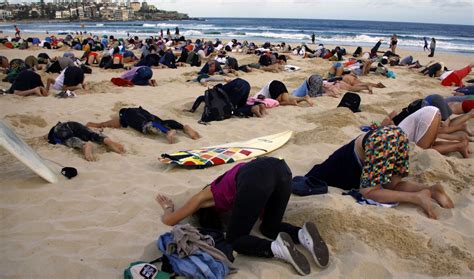 Australian Protesters Bury Their Heads In The Sand For The Environment