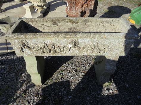 A Reconstituted Stone Planter With Stone Legs Authentic Reclamation