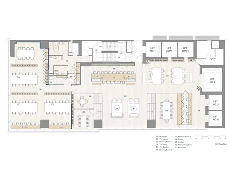 the floor plan for an office building with several tables and chairs