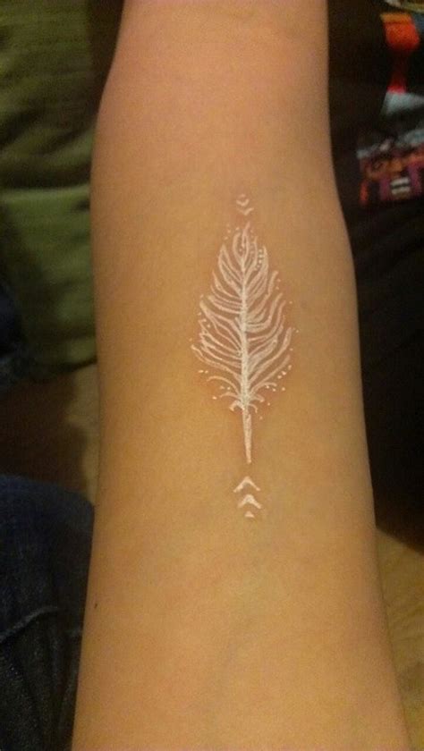 Official teaser • a hulu original. Cool white-ink-feather tattoo for girls on arm ...
