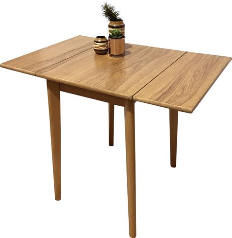 Check spelling or type a new query. Small formica kitchen drop leaf table - 1950s - Design Market