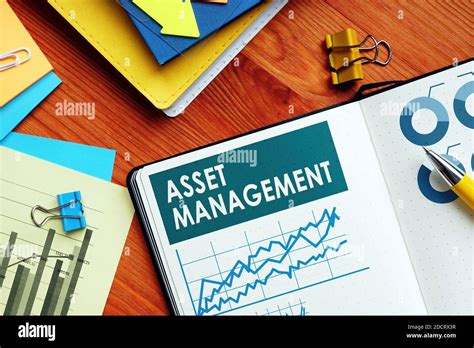 Asset Management Papers With Charts And Graphs Stock Photo Alamy