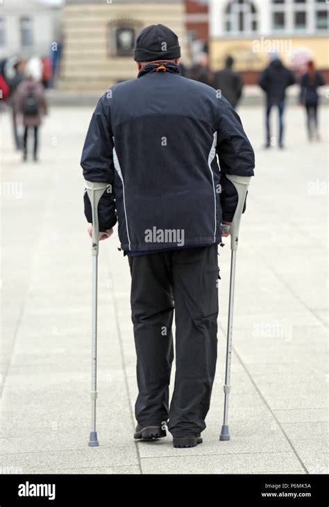 Old Man Running Crutches Hi Res Stock Photography And Images Alamy