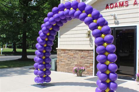 have a great dramatic entrance with a wonderful balloon arch purple arches balloon